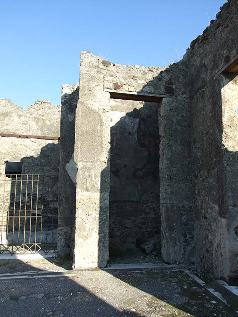 VII.16.13 Pompeii. December 2007. Doorway to room 16 on south side of entrance.