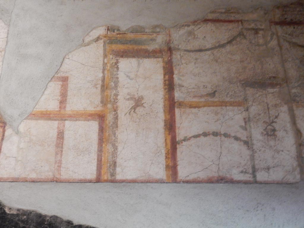 VII.16.a Pompeii. October 2020. Room 7, detail from upper south wall. Photo courtesy of Klaus Heese.