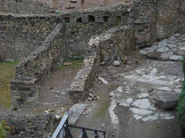 VII.16.a Pompeii. May 2010. Site of cippus of Suedius Clemens in roadway, against exterior wall of lower rooms.