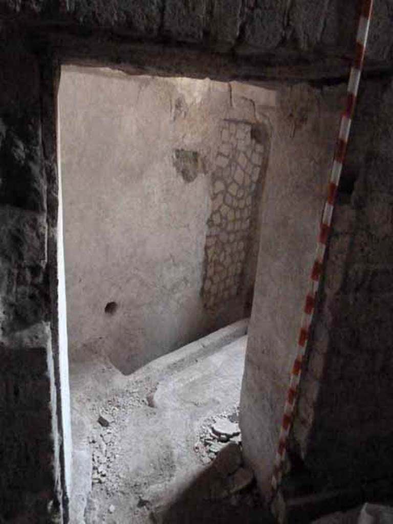 VII.16.a Pompeii. May 2010. Doorway to room 14, latrine. Looking north-west.