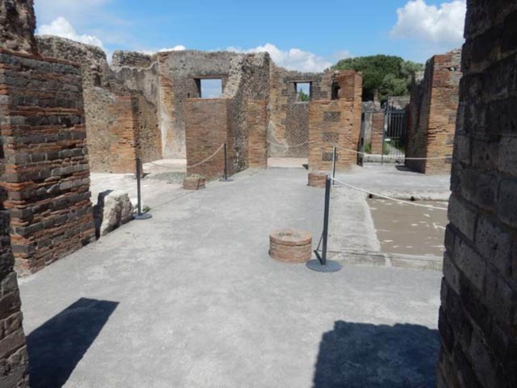 VIII.2.14 Pompeii. May 2018. Looking east along north side of atrium from end of corridor.
Photo courtesy of Buzz Ferebee.

