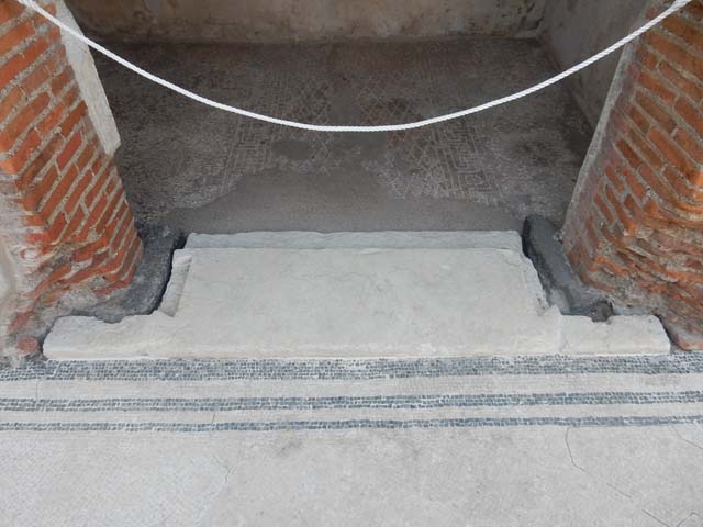 VIII.2.16 Pompeii. May 2017.  Detail of east side of doorway threshold to central cubiculum.  Photo courtesy of Buzz Ferebee.
