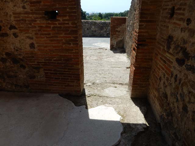VIII.2.16 Pompeii. May 2018. 
Looking south along west wall in passageway, leading to a large room which originally may have been part of VIII.2.18. 
Photo courtesy of Buzz Ferebee.
