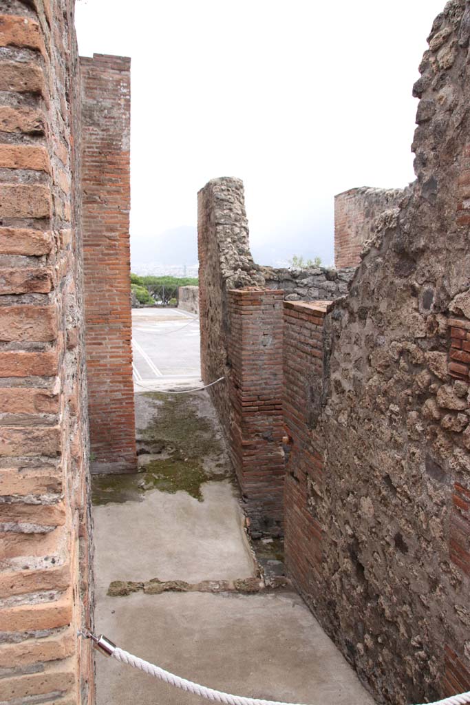 VIII.2.16 Pompeii. September 2005. Steps to upper floor, in north-east corner of portico, with corridor from VIII.2.14, on right.