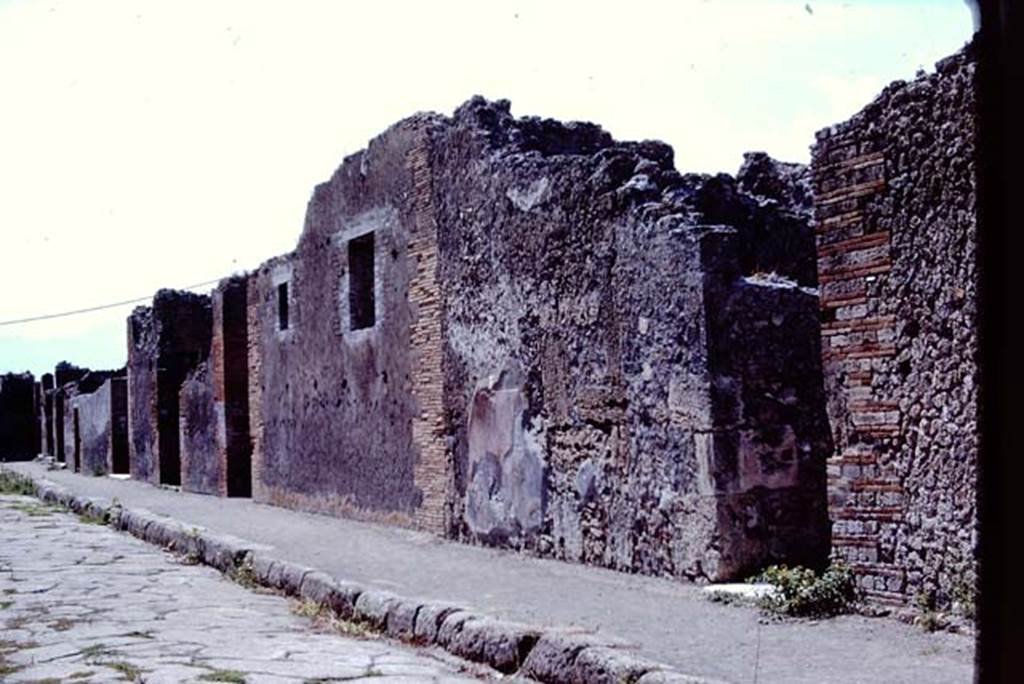 VIII.2.16 Pompeii, on left with white marble sill. 1968. West side of Via delle Scuole, looking south. 
The marble sill of the entrance doorway on the right belongs to VIII.2.13. Photo by Stanley A. Jashemski.
Source: The Wilhelmina and Stanley A. Jashemski archive in the University of Maryland Library, Special Collections (See collection page) and made available under the Creative Commons Attribution-Non-Commercial License v.4. See Licence and use details.
J68f1187


