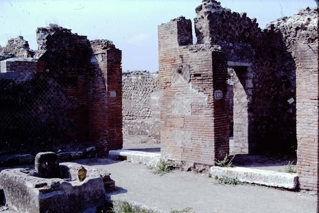 VIII.2.20 Pompeii. September 2005. Entrance to Sarno Baths with fountain outside. 