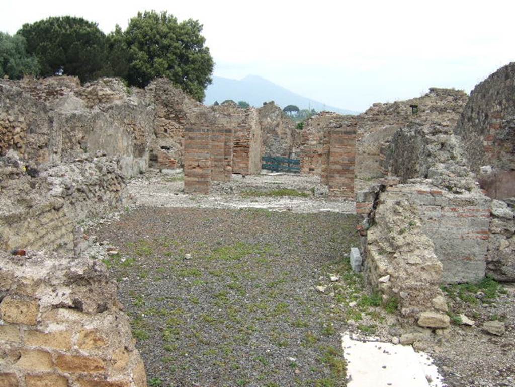 VIII.2.29 Pompeii. May 2006. Corridor on west side of tablinum leading to rooms at rear, and stairs to lower level. 