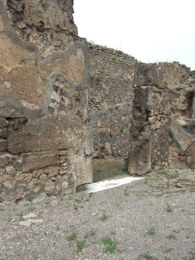 VIII.2.34 Pompeii. May 2006. Doorway to room linking to VIII.2.33, on west side of atrium.