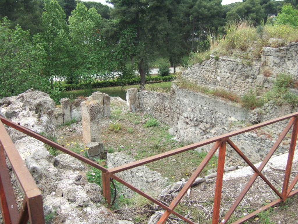 VIII.2.36 Pompeii. May 2006. Looking west at remains of lower levels.
According to Jashemski, at the rear of this double house (on both the street and lower level) were terraces overlooking the bay and mountains. The terraces at the rear of house 36 were preceded by a portico.
See Jashemski, W. F., 1993. The Gardens of Pompeii, Volume II: Appendices. New York: Caratzas. (p.209)
