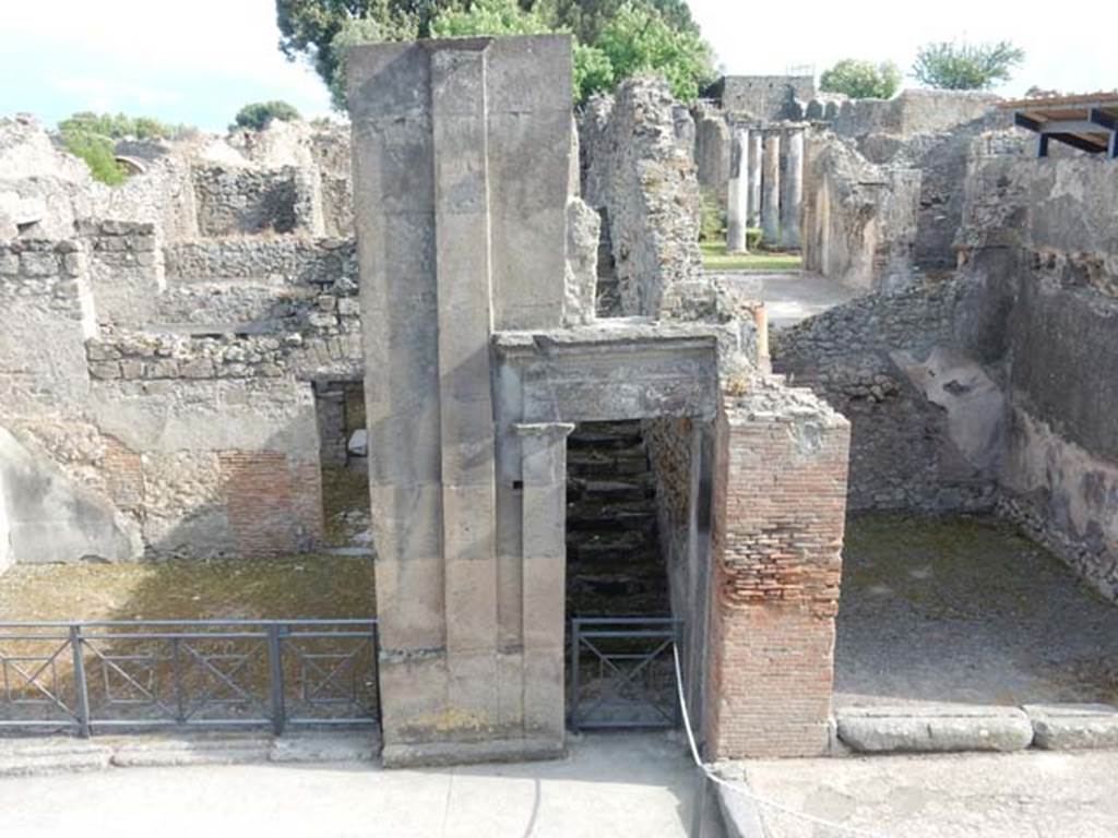 VIII.3.11 Pompeii, on left, VIII.3.10 (centre) and VIII.3.9, on right. May 2015. 
Entrance doorway taken across Via dell’Abbondanza. Photo courtesy of Buzz Ferebee.

