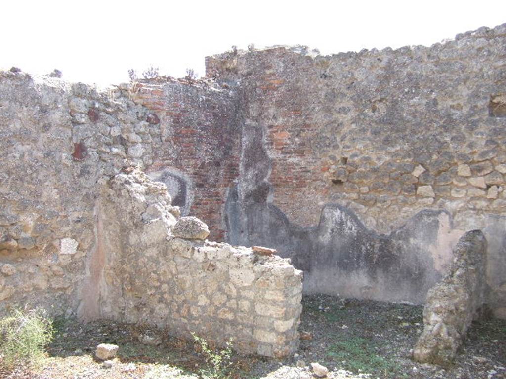 VIII.3.14 Pompeii. September 2005. Looking south in kitchen towards small storeroom. The latrine is on the extreme right of the photo.
