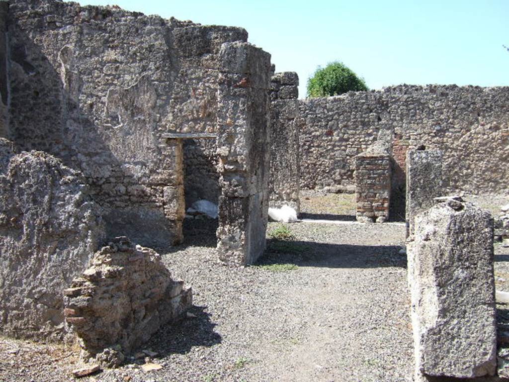 VIII.3.14 Pompeii. September 2005. Looking west across south side of atrium. On the left would be the oecus, ala, and then doorway to triclinium.  According to Helbig, in the left ala would have been paintings of uncertain local deities (no.965), Busts (nos.557 and 1421f) and a wall painting of Perseus and Andromeda (no.1191)
See Helbig, W., 1868. Wandgemälde der vom Vesuv verschütteten Städte Campaniens. Leipzig: Breitkopf und Härtel. (nos.965,557, 1421f and 1191)
.
