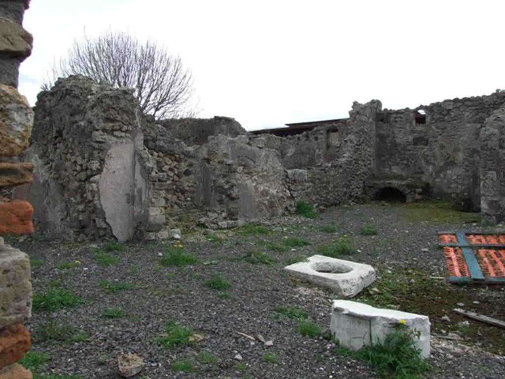 VIII.3.18 Pompeii. December 2007. East wall of atrium and south-east corner with kitchen.