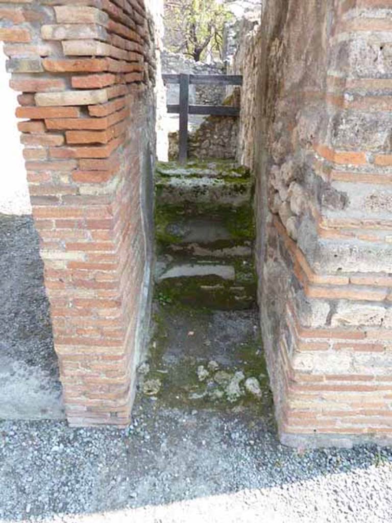 VIII.3.20 Pompeii. May 2010. Steps to upper floor. Looking east from Via delle Scuole.