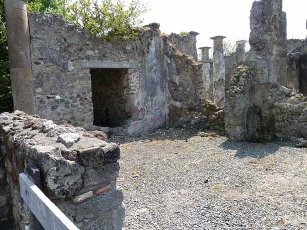 VIII.3.28 Pompeii. May 2010. Looking east across the site of the rear room towards the west portico of VIII.3.31.