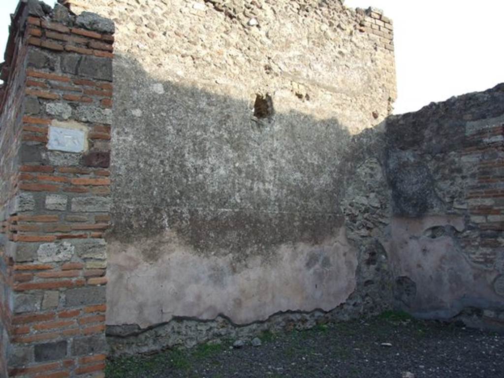 VIII.4.7 Pompeii. December 2007. East wall of shop.