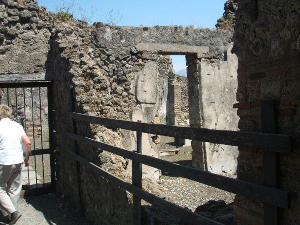 VIII.4.9 from VIII.4.8 Pompeii. May 2005.Looking into room on west side of atrium.