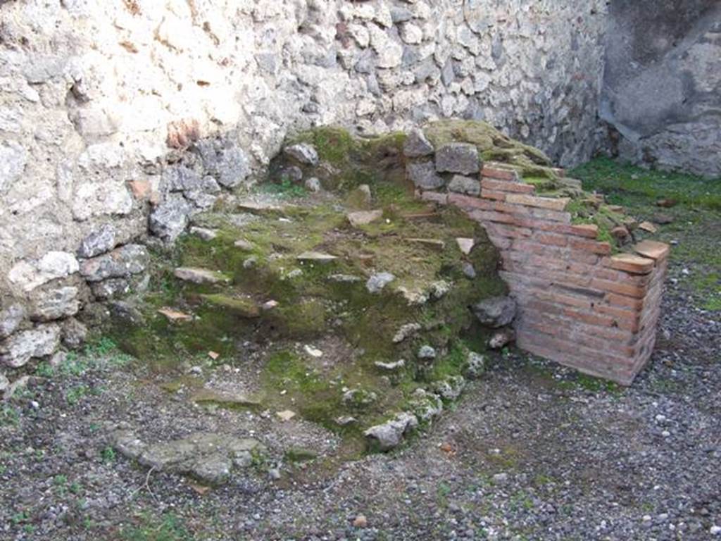 VIII.4.11 Pompeii. December 2007. Remains of stairs? with latrine under?.