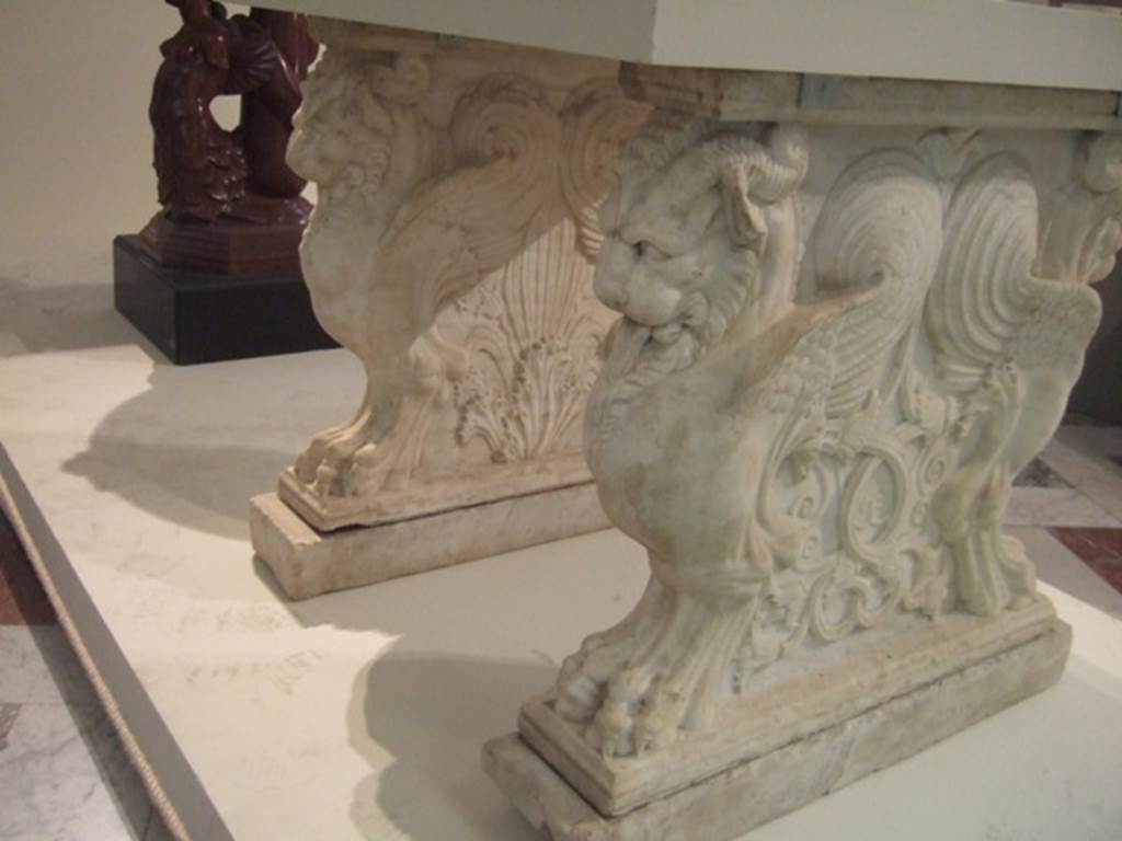 VIII.4.15 Pompeii.  December 2007.  Supports of marble table or cartibulum.  Now in Naples Archaeological Museum.
