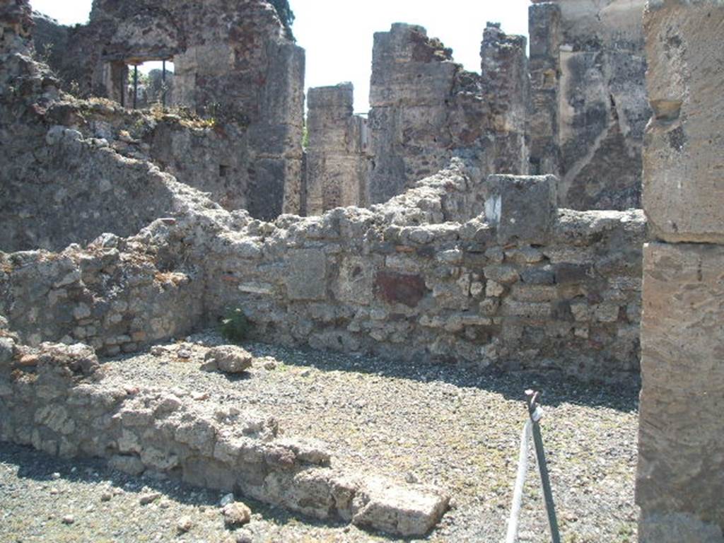 VIII.4.17 Pompeii. May 2005. Rear room in foreground, VIII.4.15 in background.  