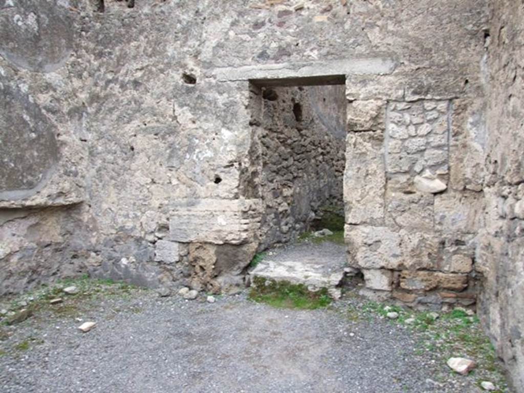 VIII.4.20 Pompeii.  Shop and rooms.  December 2007.  Middle room with door to small room at rear.
