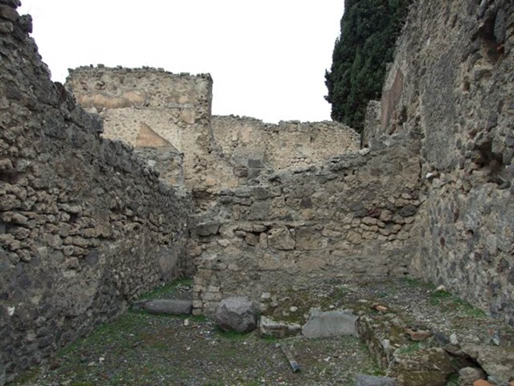 VIII.4.35 Pompeii.  Shop and room.  December 2007.  North wall of shop with room at rear.