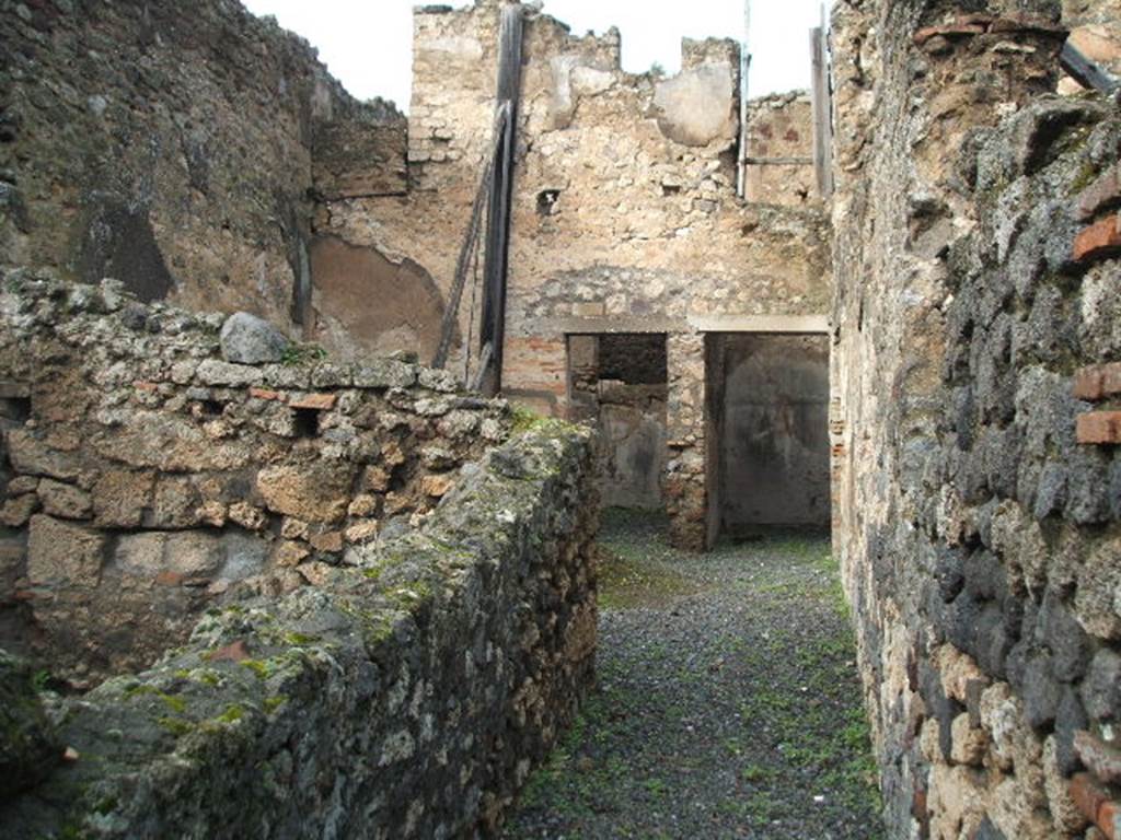 VIII.4.37 Pompeii.  House with workshop.  December 2004.  Looking north along entrance corridor.