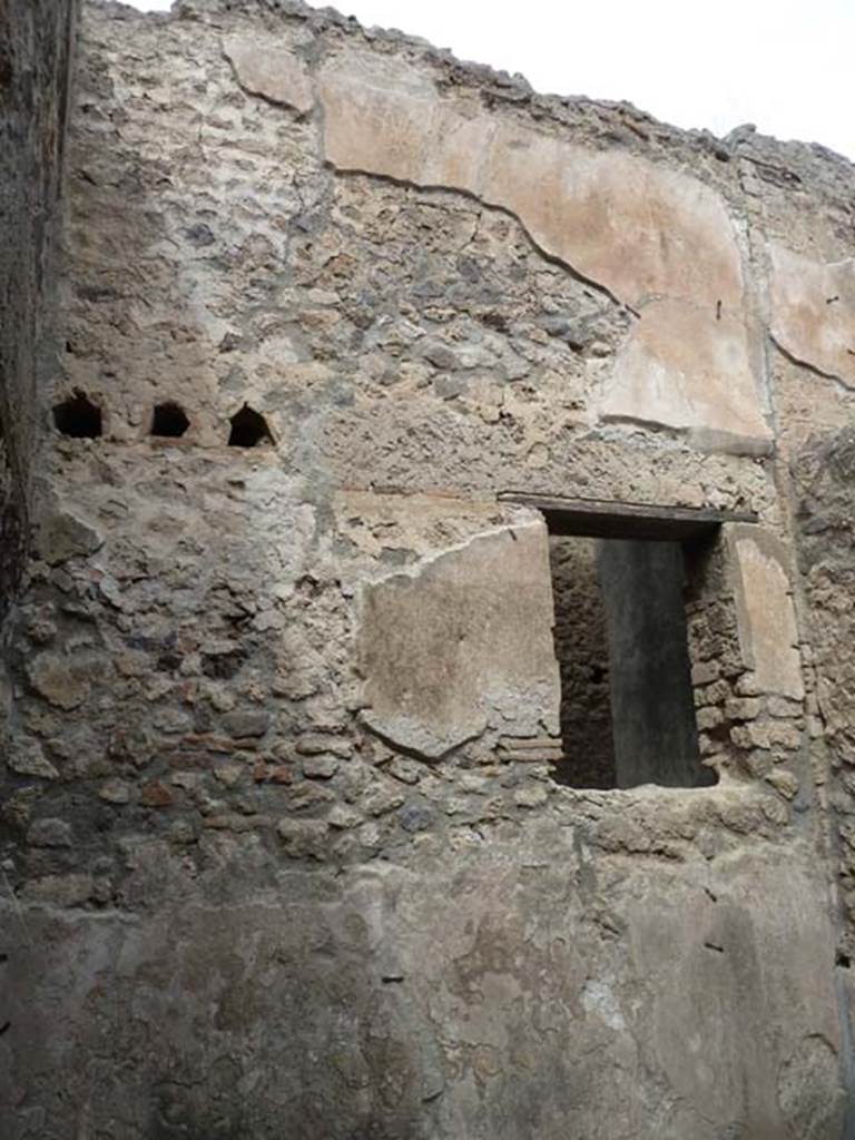 VIII.4.37 Pompeii. September 2015. North wall with window into a rear room of VIII.4.44.