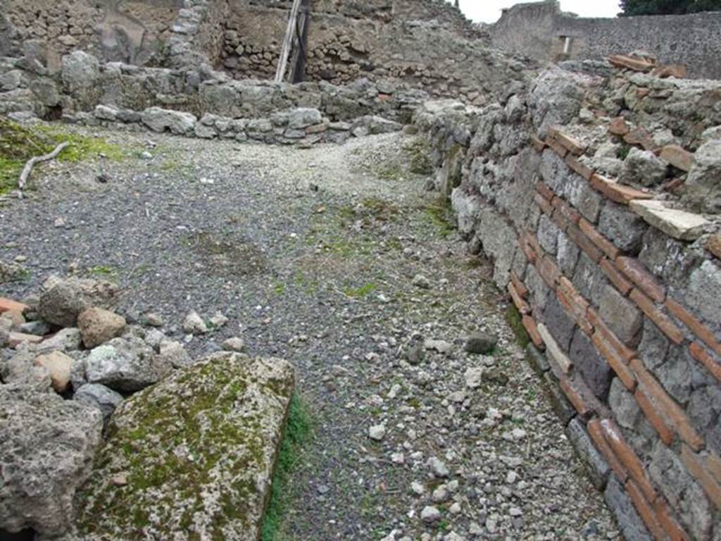 VIII.4.41 Pompeii.  Public latrine.  December 2007.  Looking east from entrance.  Latrine is at the front and VIII.4.42 is at the rear.
