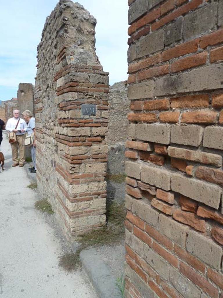 VIII.4.49 Pompeii. September 2015. Entrance doorway, looking north on Via dei Teatri.