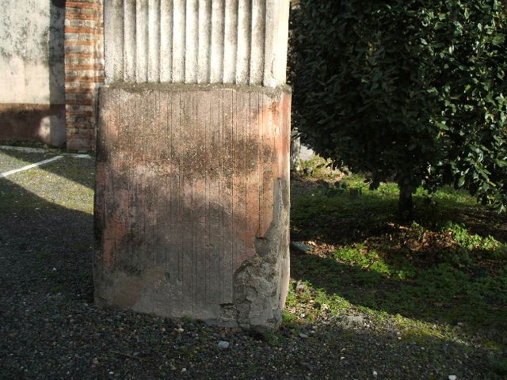 VIII.4.4 Pompeii from VIII.4.49. December 2004. Pillar in the north-west corner of the peristyle garden.