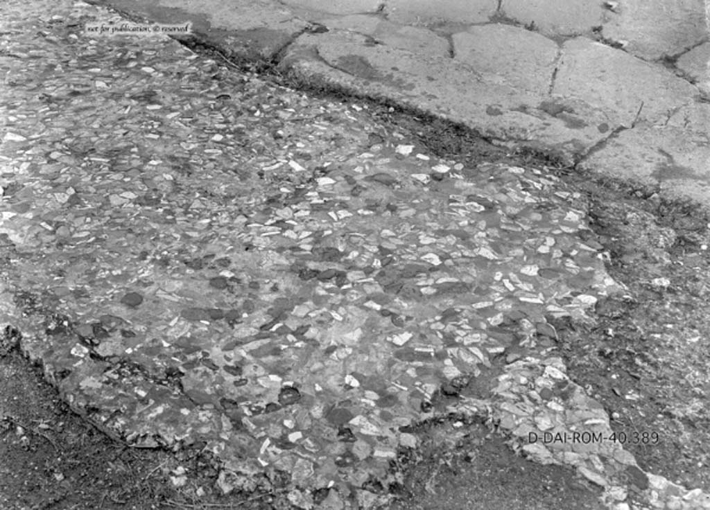 VIII.5.2 Pompeii. c.1930. Flooring of the pavement in front of the house on south side of Via dell’Abbondanza.
DAIR 40.389. Photo © Deutsches Archäologisches Institut, Abteilung Rom, Arkiv.
See Pernice, E.  1938. Pavimente und Figürliche Mosaiken: Die Hellenistische Kunst in Pompeji, Band VI. Berlin: de Gruyter, see tav. 14.5, above.)
