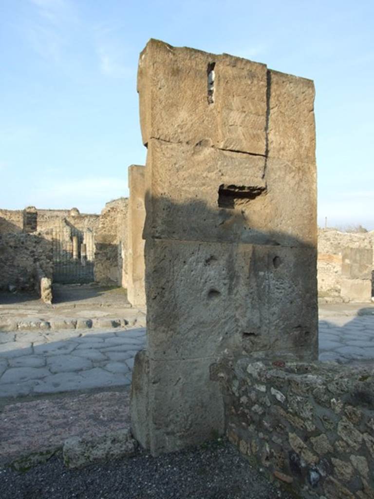 VIII.5.3 Pompeii. December 2007. Rear of east side entrance pillar. Looking north towards Via dell’Abbondanza.

