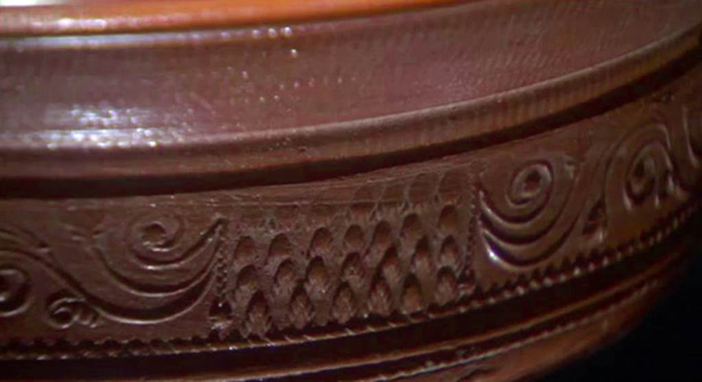 Detail from bowl found in tablinum of VIII.5.9. Now in Naples Archaeological Museum.