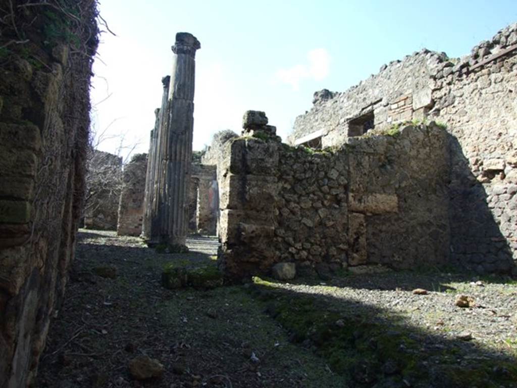 VIII.5.14 Pompeii.  March 2009.  Looking west from entrance, and room on north side of corridor.