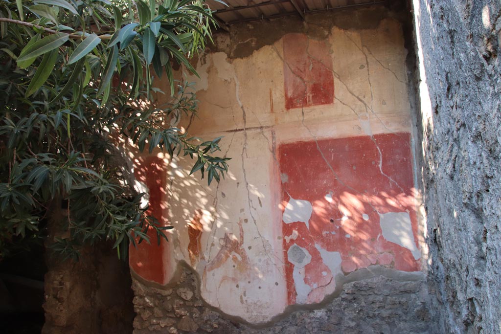 VIII.5.15 Pompeii. October 2022. Room 2, painted panels on west wall of triclinium. Photo courtesy of Klaus Heese. 

