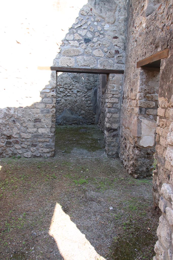 VIII.5.16 Pompeii. October 2022. 
Room 9, looking through doorway to room 10 in north wall, and to room 11 in east wall, on right.  
Photo courtesy of Klaus Heese. 
