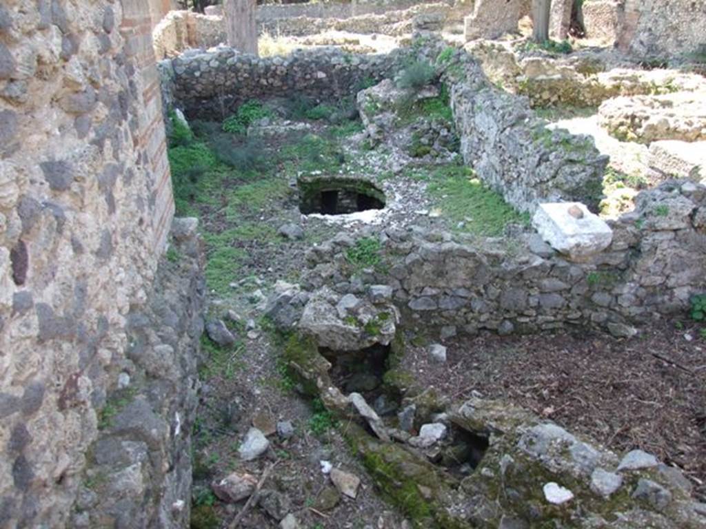 VIII.5.36 Pompeii. March 2009. 
Taken from VIII.5.28. Looking south across angiportus at east end, towards site of men’s caldarium.
