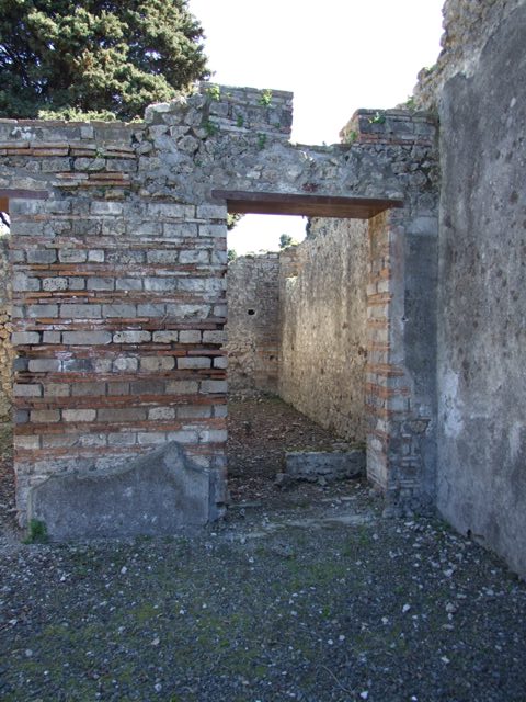 VIII.5.37 Pompeii. May 2017. Detail of doorway to room 2. Photo courtesy of Buzz Ferebee.