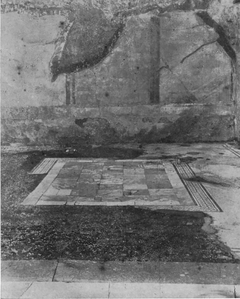 VIII.6.10 Pompeii. c.1930. 
Looking across flooring in triclinium ‘p’, shown as a central emblema in opus sectile set in a white mosaic with border of two black lines.
See Blake, M., (1930). The pavements of the Roman Buildings of the Republic and Early Empire. Rome, MAAR, 8, (p.44f, & Pl.8, tav.2, as VIII.6.1)
