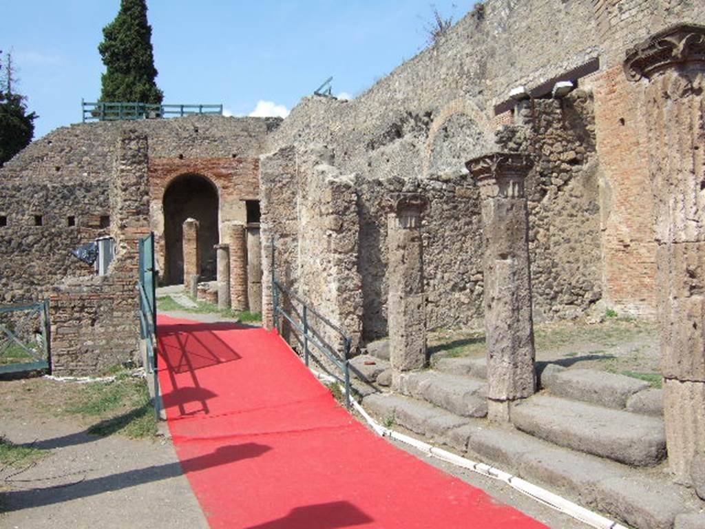 VIII.7.16 Pompeii. September 2005.  Gladiators Barracks looking north to the Large Theatre.

 
