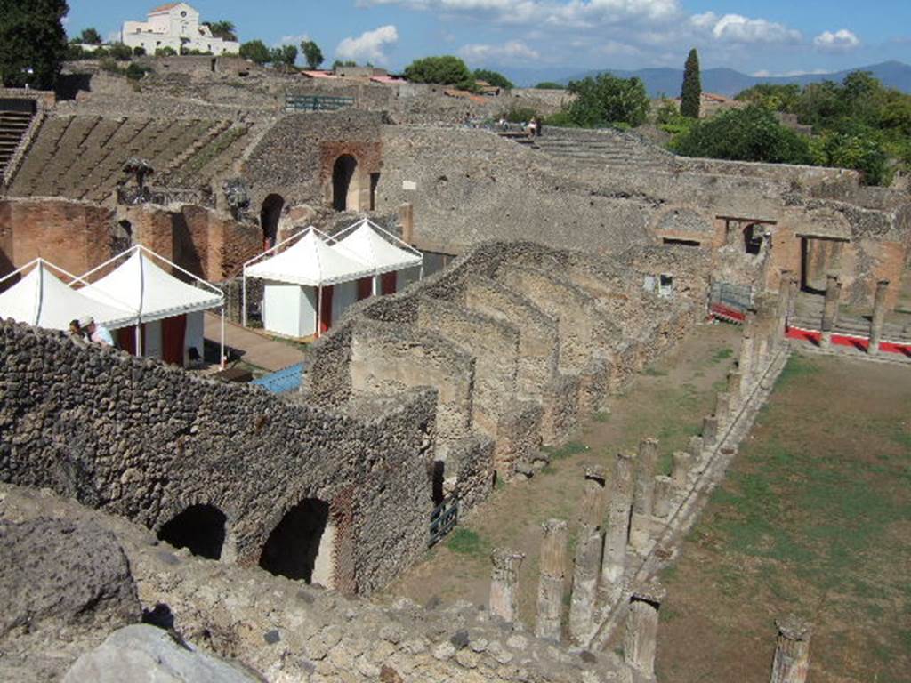VIII.7.16 Pompeii. September 2005. Looking north-east across Gladiators Barracks and Large Theatre from Triangular Forum.
