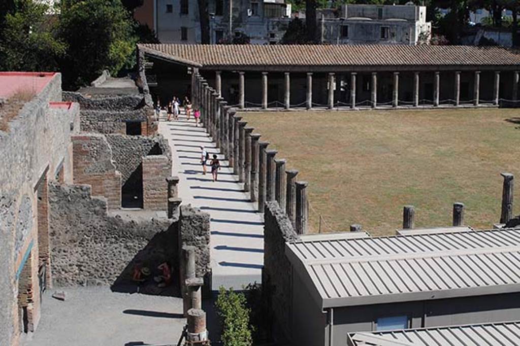 VIII.7.16 Pompeii. July 2012. Looking south from Large Theatre, across the east side of the Gladiators’ Barracks. Photo courtesy of John Vanko. His father took the identical photo in February 1952, see below.

