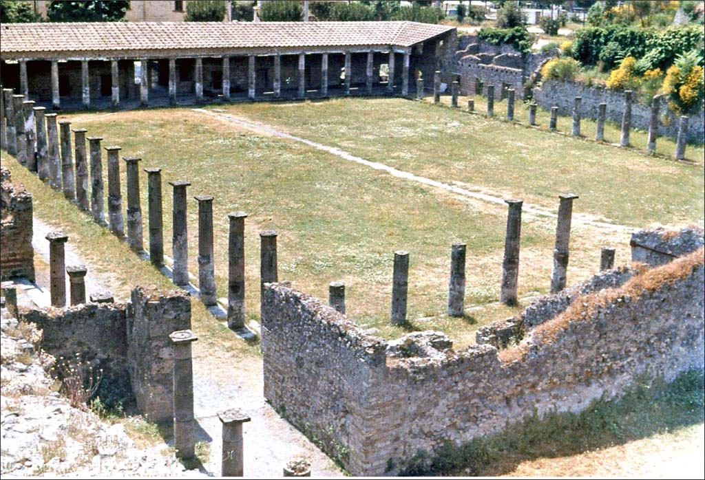 VIII.7.16 Pompeii. June 1962. Looking south and west from above north-east corner.
Photo by Brian Philp: Pictorial Colour Slides, forwarded by Peter Woods
(P43.23 POMPEII The Small Palaestra or Doric Portico).
