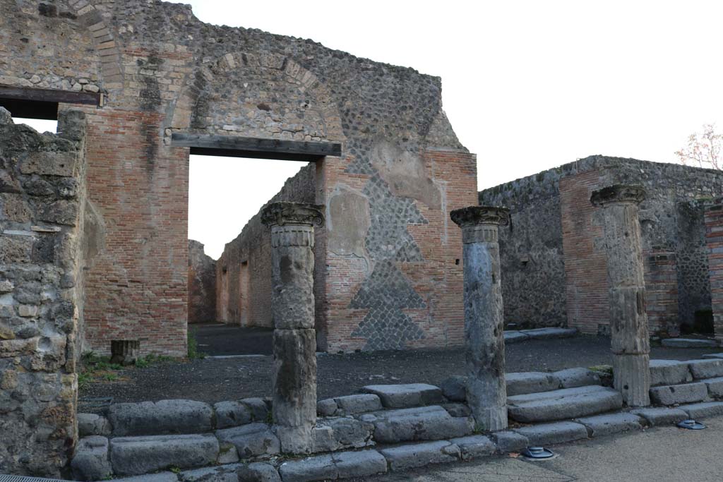 VIII.7.17 Pompeii, centre left, and VIII.7.16, on right. December 2018. 
Looking east from north-east corner of Gladiators’ Barracks. Photo courtesy of Aude Durand.

