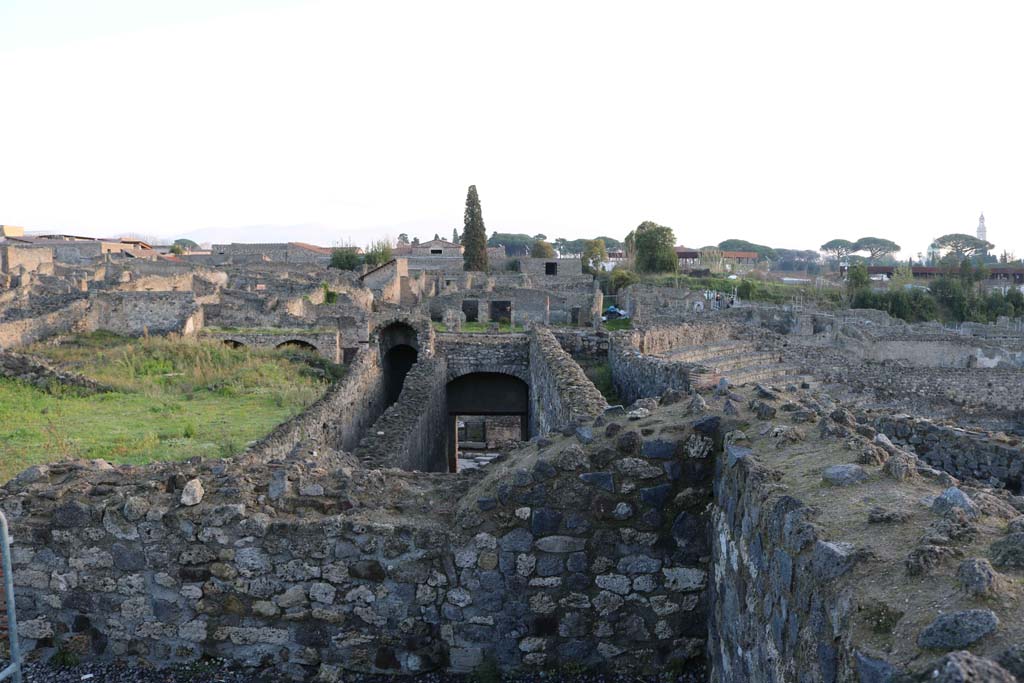VIII.7.21 Pompeii, on left, and VIII.7.20, in centre. December 2018. 
Looking east from entrance corridors towards Reg. 1, insula 3. Photo courtesy of Aude Durand. 

