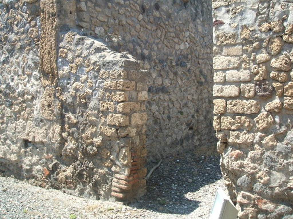 VIII.7.25  Pompeii. December 2006. Doorway to Room for the priest on north side of entrance. 