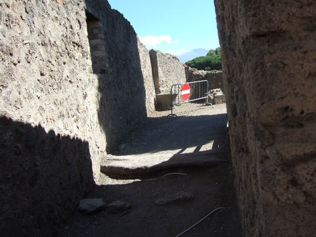 VIII.7.27 Pompeii. September 2005. Looking south along passage to Large Theatre.