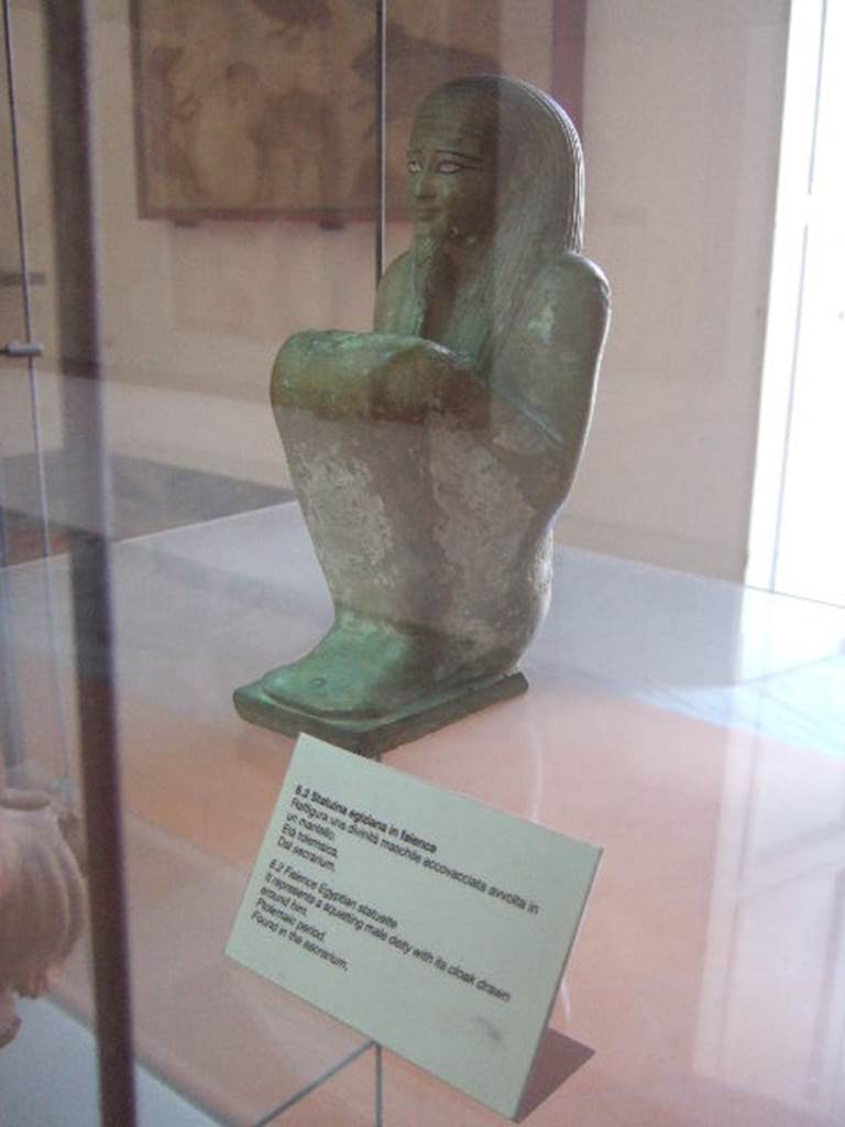VIII.7.28 Pompeii.  Squatting Egyptian male deity found in the Sacrarium.  
Now in Naples Archaeological Museum.
