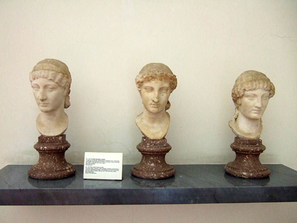 VIII.7.28 Pompeii. Three marble busts of women found in the Sacrarium. 
Now in Naples Archaeological Museum. Inventory numbers 6285, 6284 and 6289.
